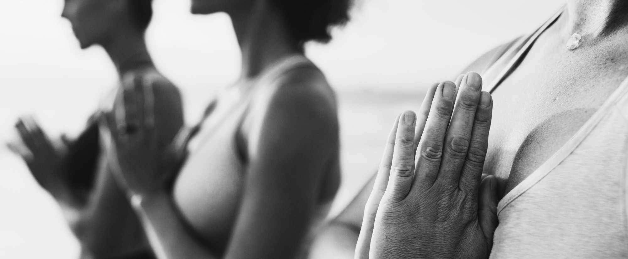 Two people in a quiet moment of practice